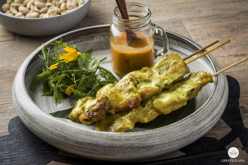 Barbecue marinated organic chicken skewers, peanut miso and pickled cucumber.